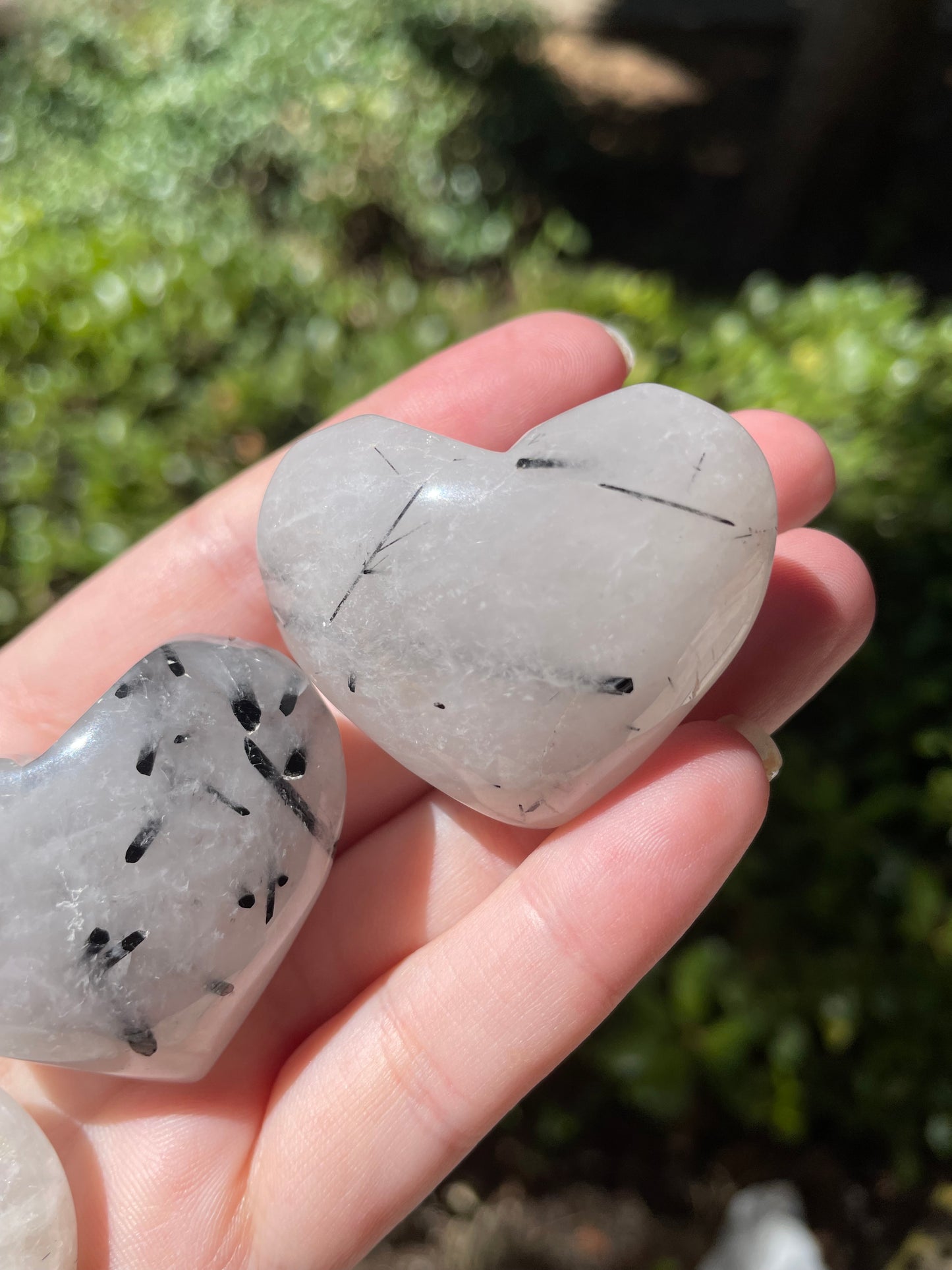 Black Tourmaline in Quartz Heart Crystal Carvings